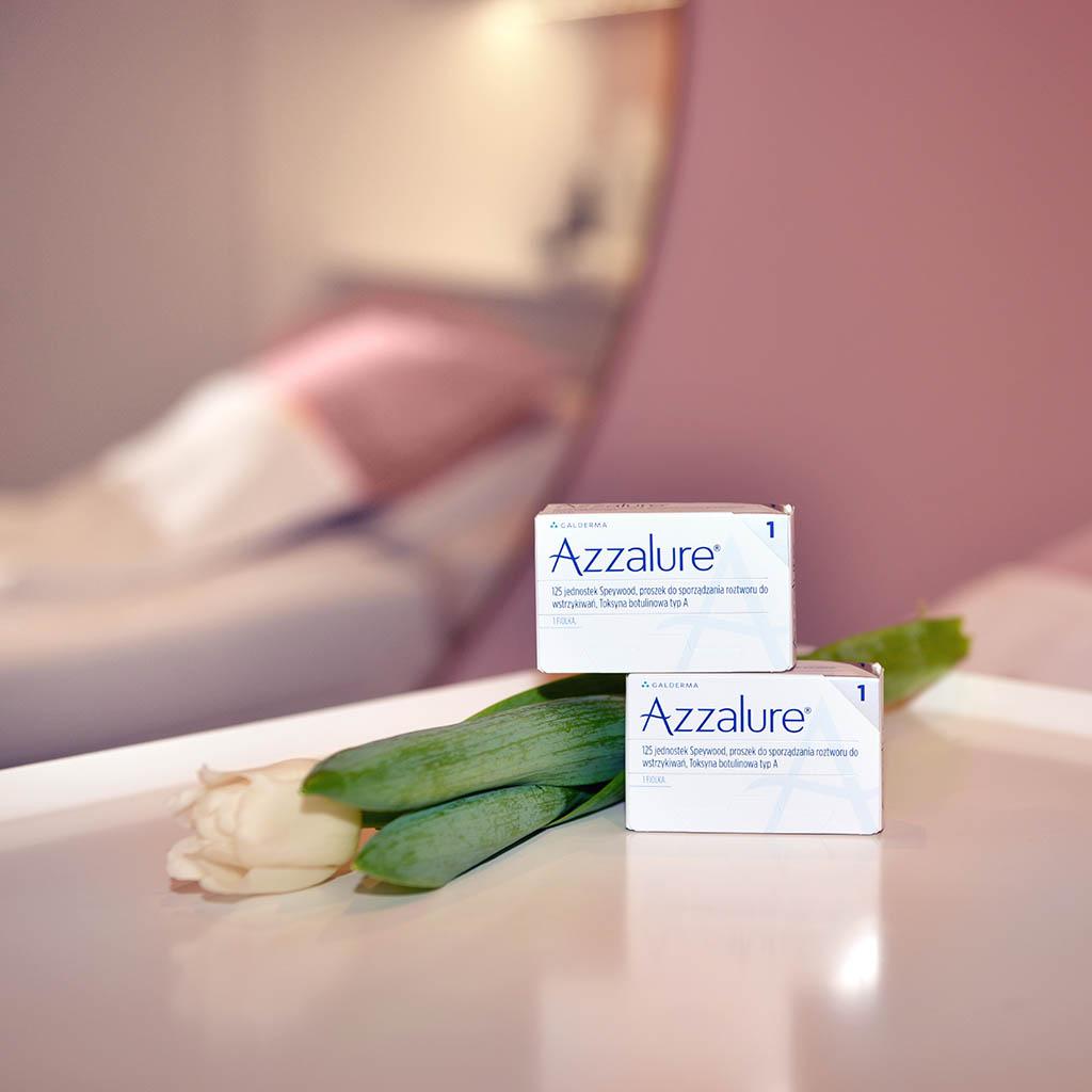Botox and hyaluronic acid vials with syringes, used for cosmetic treatments.