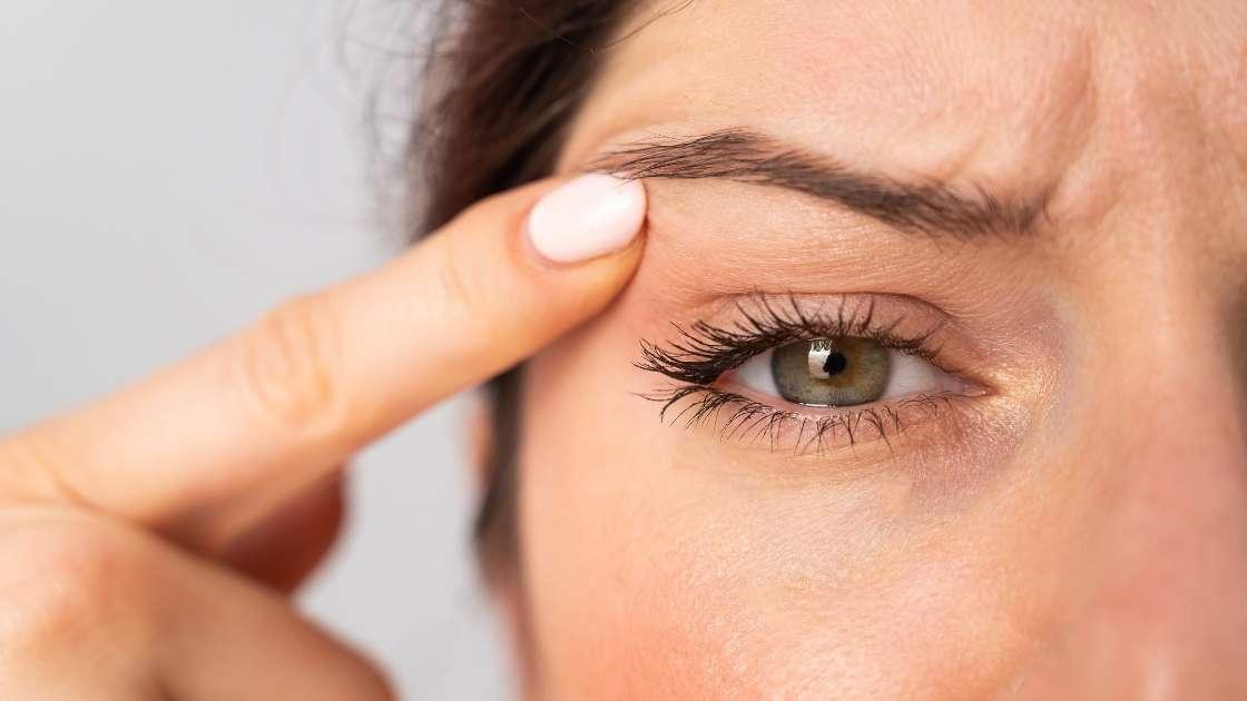 Surgical options for correcting drooping eyelids include blepharoplasty and ptosis correction procedures.