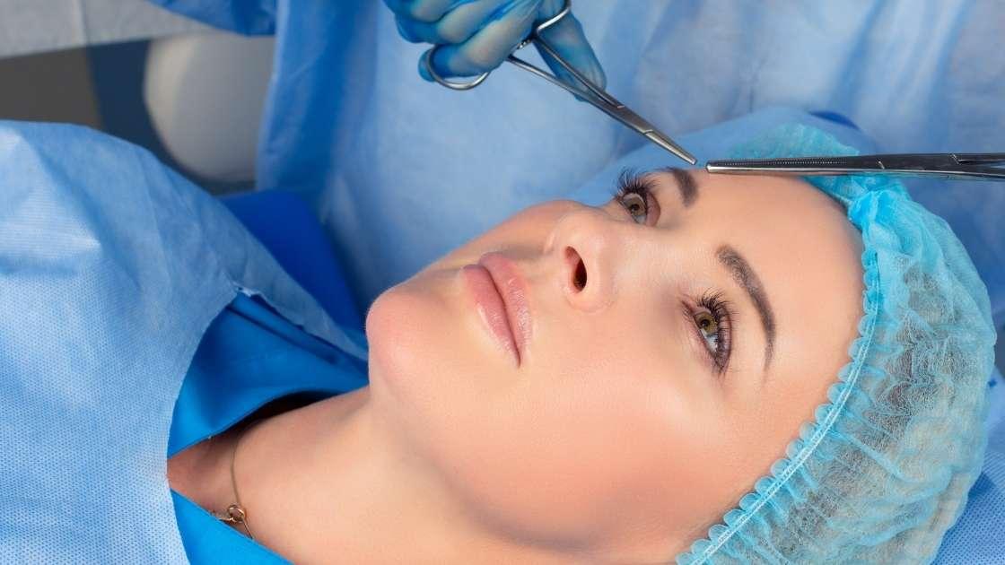Surgical tool set for lower eyelid surgery on a medical tray.